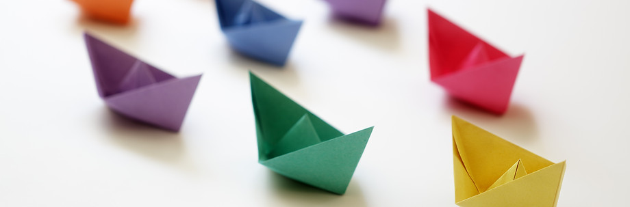 Origami colorful folded boats